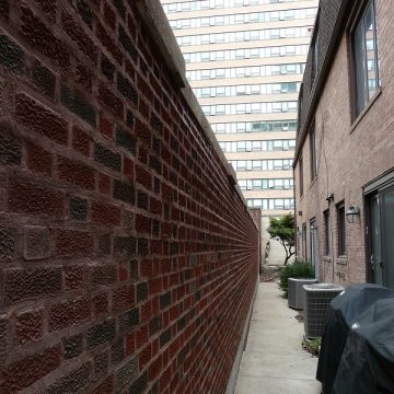 long view of brick wall
