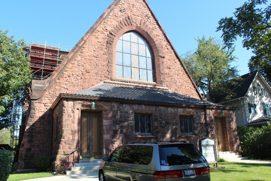 Scaffolding erected on the sandstone steeple of Emmanuel United Methodist Church in Evanston during exterior masonry restoration