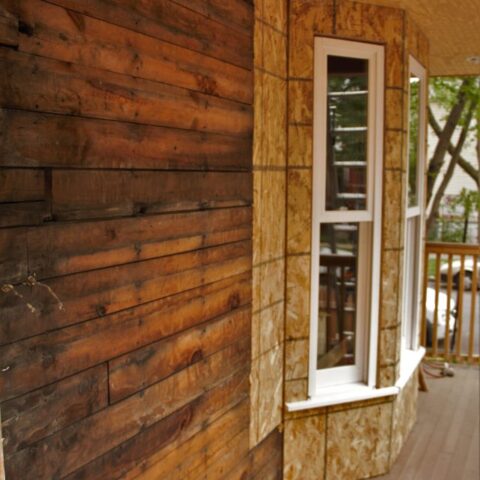 Close-up of original 1893 wood clapboard siding uncovered during restoration of the Walt Disney birthplace home in Chicago